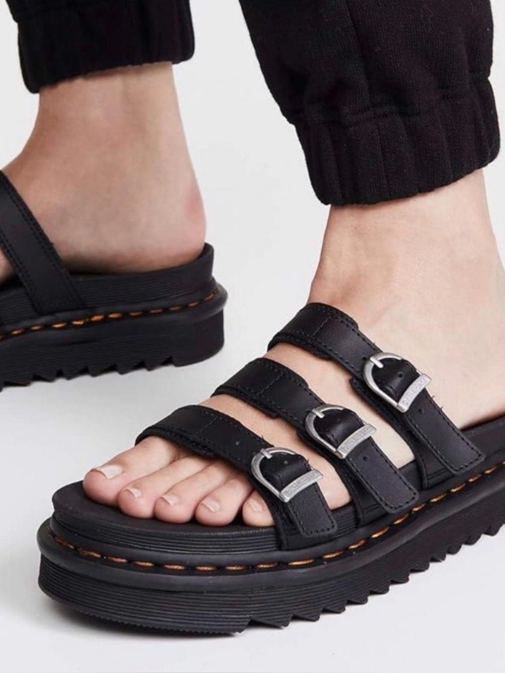 Dr. Martens Black Leather Triple-Buckle Platform Slides with Yellow Stitching